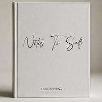 A hardcover artist book titled 'Notes To Self' by Anna Sudbina, featuring a minimalist white cover with black script text, set against a neutral beige background.